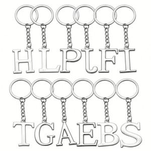 Venta al por mayor de fábrica, se pueden personalizar 26 letras inglesas, accesorios que no se desvanecen, colgante de llavero hueco de acero inoxidable - Product Image 5
