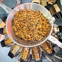 Vente chaude, machine d'emballage de haute qualité pour aliments soufflés, chips de pommes de terre, chips de banane, ligne d'emballage automatique de popcorn avec remplissage d'azote