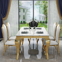 Ensemble de table à manger rectangulaire moderne de luxe en acier inoxydable doré avec plateau en marbre blanc pour 6 personnes