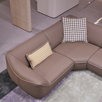 Ensemble de canapés d'angle en L incurvé de designer, en cuir véritable épais et rembourré en éponge, pour salon de villa de luxe moderne