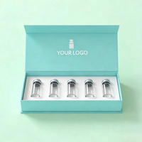 Boîte cadeau de luxe de haute qualité avec couvercle rabattable et insert en mousse, conçue sur mesure pour l'emballage de petits flacons vides de peptides.