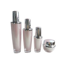 Ensembles de bouteilles d'emballage cosmétique en acrylique de forme ovale de 30ml/80ml/100ml/15g/30g/50g