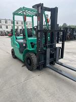 Chariot élévateur diesel d'occasion Mitsubishi FD30 de 3 tonnes avec pneus pleins et mât à deux étages