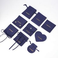 Pochette de luxe haut de gamme Jinsky en microfibre avec fermeture à pression et cordon de serrage, motif cœur estampé à chaud, pour ranger colliers et boucles d'oreilles