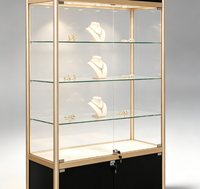Vitrine de Luxe Personnalisée en Métal pour Bijoux avec Éclairage LED pour Centre Commercial - Présentoir en Verre Durable et de Haute Qualité
