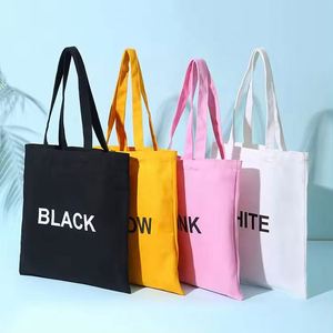 กระเป๋าผ้าแคนวาสสีพื้นแบบการ์ตูน ขนาดปรับแต่งได้ ปิดด้วยซิป มีสายสะพายไหล่ สำหรับใช้เป็นของแจก โปรโมชั่น พร้อมสกรีนชื่อแบรนด์ตามสั่ง - Product Image 2