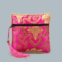 Pochette à bijoux en brocart brodé avec fermeture éclair, sac cadeau en soie avec pompon pour le rangement de colliers et bagues, vente en gros