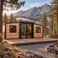 Cabane de vacances extensible préfabriquée de 40 pieds avec extension double face, fenêtres panoramiques, extérieur imitation bois et intérieur spacieux