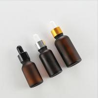 Bouteille compte-gouttes en verre ambré de 30 ml pour huiles essentielles avec impression de logo personnalisé, col en bois de Sapele et base épaisse en caoutchouc