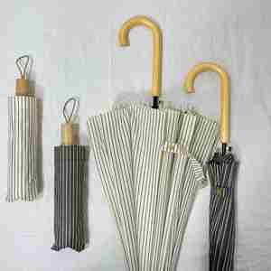 Paraguas Plegable Manual Reforzado de Tres Pliegues con Protección UV, Resistente al Viento y a la Lluvia, con Rayas Coreanas y 8 Varillas, Ideal para Regalo Publicitario Transfronterizo - Product Image 2