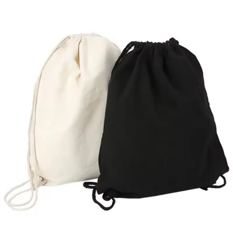 Vente en gros de sac en toile en coton doux et lavable réutilisé en blanc et noir avec logo personnalisé à cordon