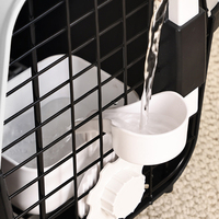 Cage de transport portable en plastique respirant pour animaux de compagnie (chiens et chats) en gros