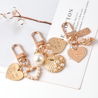 Personnalisé 3D Métal Alliage de Zinc Paillettes Mignon Coeur Perle Porte-clés Acssesoriess Diy Tendance Mer Plage Perle Coquillage Concha Porte-clés