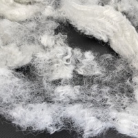 Filament de polyester conjugué siliconeé 15D 64mm, antistatique, recyclable, pour rembourrage doux de jouets, oreillers et couettes (matière première)