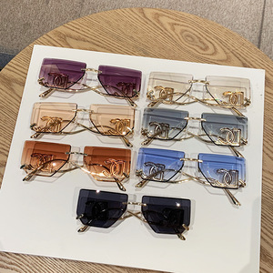 Fashion Frameless Cut Edge Oversized <b>Sunglasses</b> With Hollow Letter Design For Women UV400 Protection Metal Frame PC Lens - Product Image 3