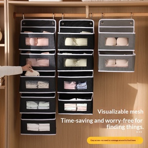 Bolsa de almacenamiento multifuncional de tela no tejida para colgar en la puerta, moderna, para dormitorios, con espacio para teléfonos, disponible para envío transfronterizo. - Product Image 1