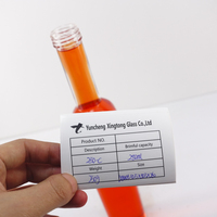 La bouteille en verre transparente de haute qualité de 250ml accepte la bouteille de vin d'eau de luxe personnalisée avec échantillon gratuit pour le stockage d'alcool de vodka