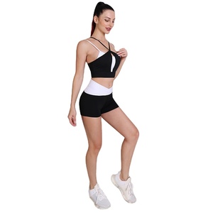 Conjunto de yoga de 2 piezas para mujer, pantalones cortos de cintura alta con bloques de color y sujetador deportivo cruzado, ropa deportiva para gimnasio - Product Image 5