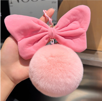 Vente en gros de porte-clés en peluche douce et moelleuse avec un grand nœud en fourrure, pompon en peluche, dessin animé d'Halloween, pendentif de sac, cœur