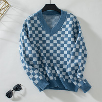 Maglione con motivo a scacchiera invernale all'ingrosso con scollo a V a tracolla manica lunga Pullover larghi a coste in maglia a quadri maglioni da donna