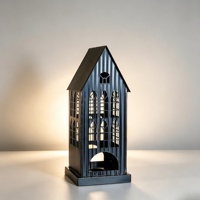 Nouvelle lanterne de Noël de style pastoral en fer forgé ajouré, porte-bougie décoratif en forme de petite maison