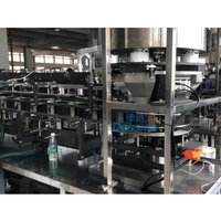 Machine de remplissage automatique de boîtes de poudre à lessive, machine d'emballage de boîtes de poudre à lessive, machine d'emballage de cartons de poudre à lessive