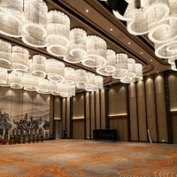 Lustre circulaire combiné en cristal, luminaire suspendu LED personnalisé pour hall d'hôtel, salle de banquet, éclairage de plafond pour projets d'ingénierie