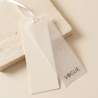 Étiquette de logo ronde de vêtement de luxe de balançoire spéciale de papier respectueux de l'environnement personnalisé