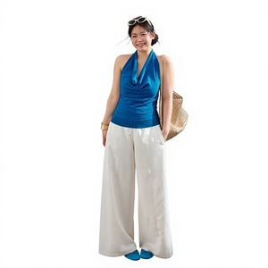 Ensemble pantalon long et moulant décontracté blanc uni avec haut court sans manches à col halter, nouvelle collection 2026, grande taille pour femme Zhang Da Ren - Product Image 1