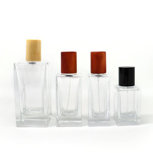 30ml 50ml 100ml Thick Bottom <b>Clear</b> Crimp Neck Empty <b>Glass</b> Spray Perfume Bottle With Wooden Cap - Product Image 1