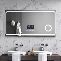 Miroir de salle de bain LED intelligent rectangulaire moderne à prix d'usine avec haut-parleur Bluetooth et capteur tactile pour l'amélioration de la maison et du bureau