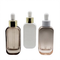 Flacon compte-gouttes plat en verre de luxe 30ml 50ml avec bouchon doré, personnalisable avec logo estampé à chaud, pour diffuseur de parfum et cosmétiques essentiels