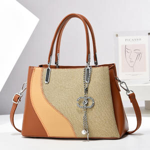 Bolso de mano de cuero con cadena de lujo para <span class=keywords><strong>mujer</strong></span>, novedad de 2025, estilo moderno, bolso de mano, forro de PU, precio de salida, venta al por mayor - Product Image 1