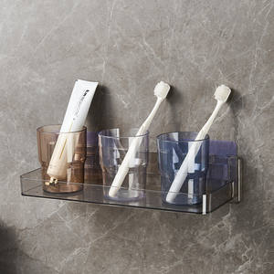 ที่วางแก้วติดผนังแบบใสสำหรับแปรงสีฟันและน้ำยาบ้วนปาก ที่จัดระเบียบห้องน้ำพลาสติกพร้อมแก้วสามสี - Product Image 1