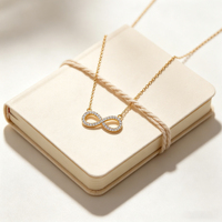 Collier Pendentif Infini en Laiton Plaqué Or 18K avec Zirconiums AAA, Vente en Gros Hengdian