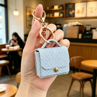 Nouveau style mini sac à main porte-clés en cuir PU, étui pour écouteurs, mini sac de rangement, pendentif pour sac à dos pour écouteurs Bluetooth, idéal pour un cadeau