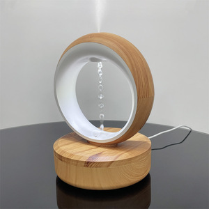 Escritorio eléctrico 680ml LED atmósfera luz ultrasónica niebla fría levitando gota de agua inteligente antigravedad humidificadores de aire - Product Image 1