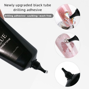 Colle à ongles en tube de 15 ml en gros, étiquette privée personnalisée OEM, colle forte sans essuyage pour strass et diamants sur les ongles - Product Image 1