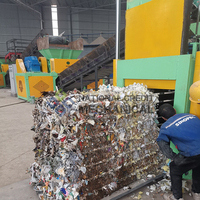 Presse à balles hydraulique pour plastique, carton, pneus usagés et déchets solides