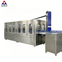 Machine de remplissage, lavage et bouchage automatique pour eau minérale pure en bouteilles plastiques de 2L, capacité 15000-18000 BPH