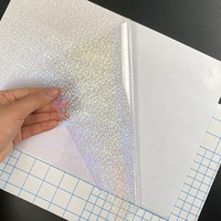 Film de laminage à froid holographique laser, film protecteur auto-adhésif brillant arc-en-ciel pour l'impression d'albums photo et d'affiches
