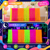 Jupe de table néon fluorescente, rideau à franges ondulées en guirlande, décoration de fête qui brille dans le noir pour anniversaires et événements UV sous lumière noire