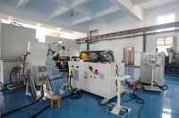 Ligne de production entièrement automatique de tiges de repose-tête avec machine de cintrage de tubes CNC, presse à encoches, marquage laser et transfert robotisé