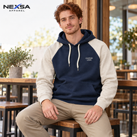 Sweat à capuche décontracté pour homme à blocs de couleur avec manches raglan contrastantes et poche kangourou, personnalisable avec logo, vente en gros, prix bas, OEM