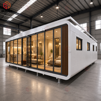 Maison capsule spatiale préfabriquée en acier avec mobilier, cabane Apple à trois étages, design moderne et écologique pour usage commercial et résidentiel