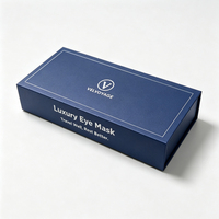 Boîte cadeau rigide en carton magnétique personnalisée bleu marine, en matériau recyclé pour l'emballage d'un ensemble de bagues, colliers et bracelets