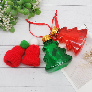 Petites bouteilles <span class=keywords><strong>en</strong></span> plastique festives et mignonnes, motifs d'étoiles de <span class=keywords><strong>sapin</strong></span> de Noël, avec bouchons dorés pour bonbons, petits cadeaux, rangement, fête de Noël - Product Image 1