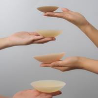 Coussinets de poitrine invisibles en silicone auto-adhésifs réutilisables imperméables de forme ronde sans couture pour femmes