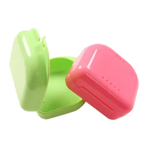 China Wholesale Colorful Orthodontic High Quality Dental Retainer Case Plastic Denture Box