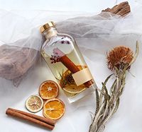 Diffuseur de parfum d'ambiance de luxe 120/180 ml en verre épais avec bouchon et bâtonnets en fibre, logo personnalisé